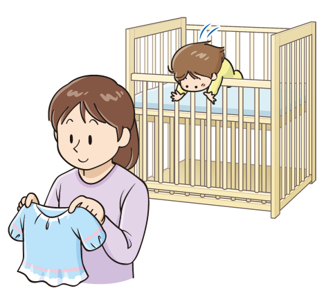 お母さんが洗濯物をたたんでいる後ろで子供がベビーベッドから落ちそうになっているイラスト